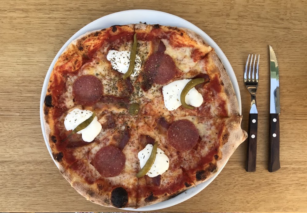 Pizza from fast food Tomatino in Baška