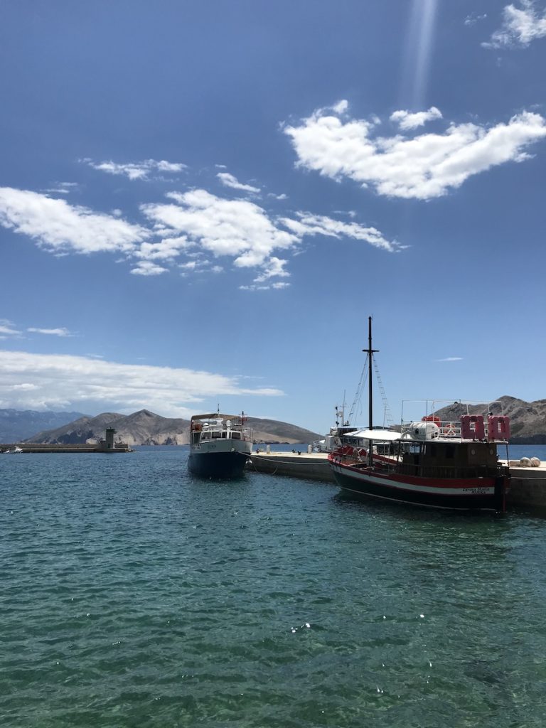 Baška port with boat excursion boats