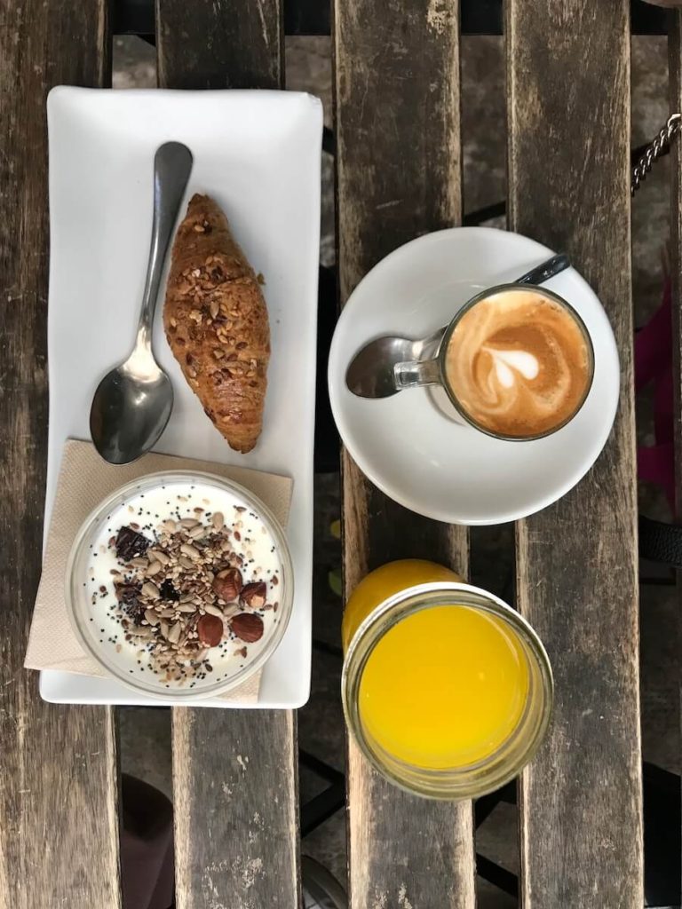 Coffee, orange juice, yogurt and croissant in Cafe ArtySana in Valencia.